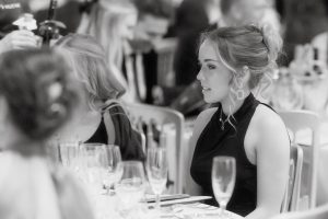 Black and white photo of a woman at a Mark Williams Foundation event